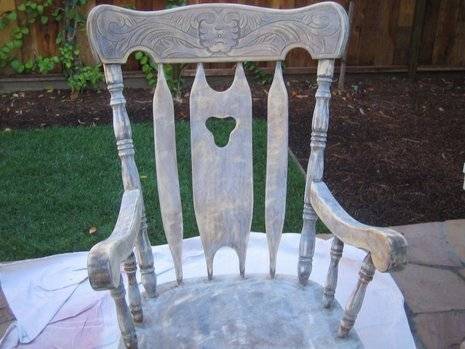 A wooden chair has been stained white.