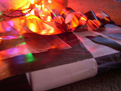 Colorful lights are glowing above a white and black object.
