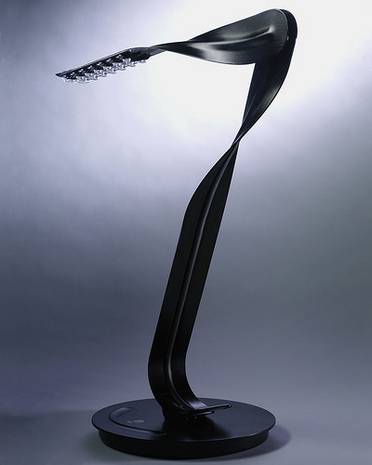 Black color table lamp.