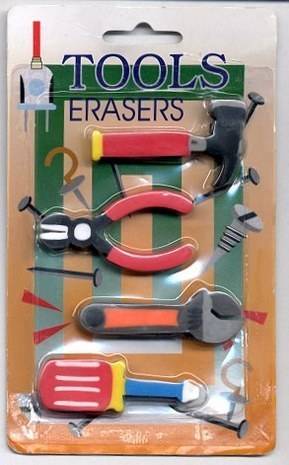 An axe,snips,wrench and screw driver packaged together in a plastic package.