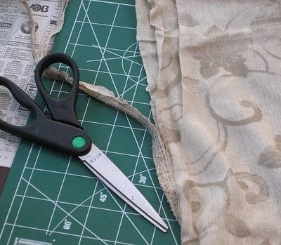 cutting the seam to open up the pillowcase