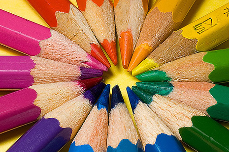 blue, purple, green, yellow and orange crayons