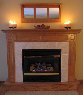 Window above fireplace in a living room.