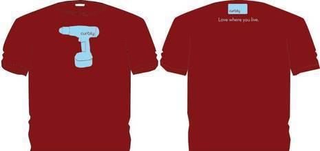 A red t-shirt with a picture of a blue drill at the top against a while background.