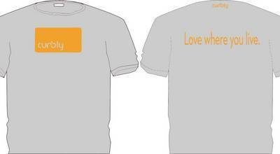 A gray t-shirt that says "love where you live." in orange lettering.