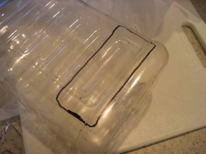 Rectangle box is marked on plastic bottle.