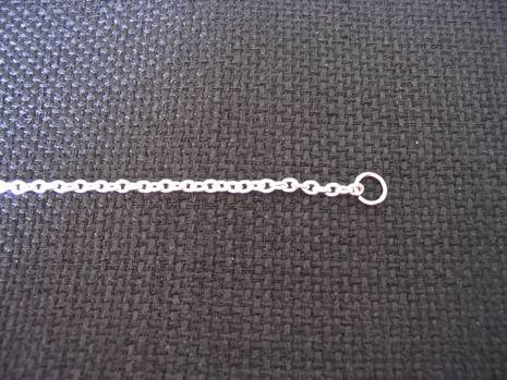 Ornamental, lightweight and white-colored chain.