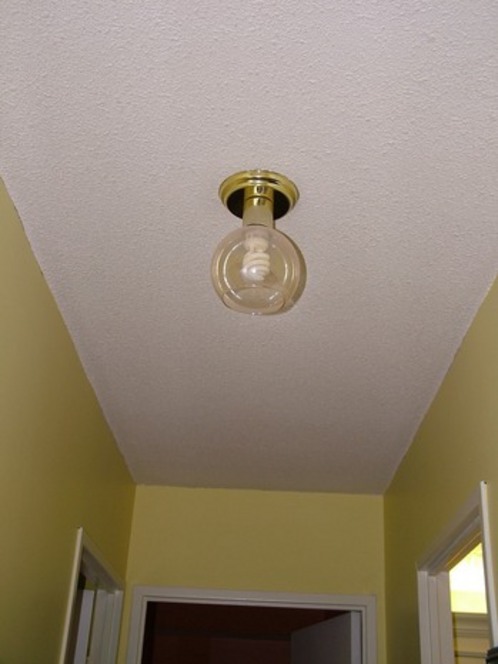 "A Small room with Simple and neat Ceiling"