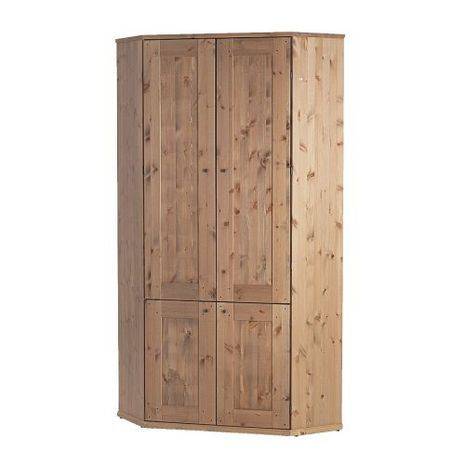 A cabinet is made out of light colored wood.