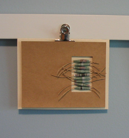 An art holding board with the clamps.