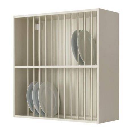 Dishes are put away in a white rack.