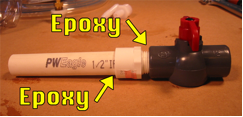 A plumbing joint with the instructions of where to apply epoxy.