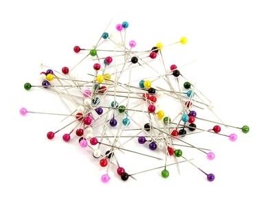 Colorful round headed sewing pins.