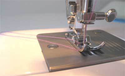 Tread is arranged to a stainless steel sewing machine.