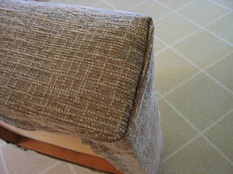 The chair make using curved upholstery needles.