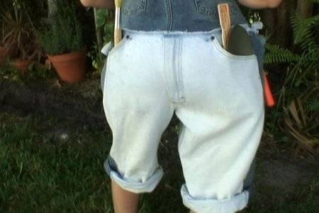 A pair of old jeans can be reused to make a Overalls.