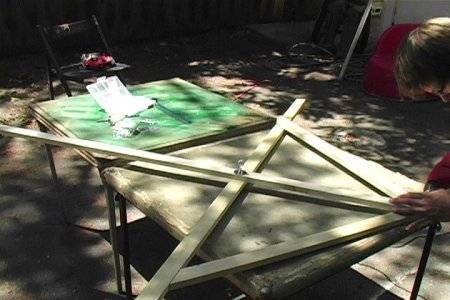 Somebody is working with wooden pieces.