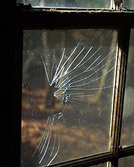 A window that has been smashed.