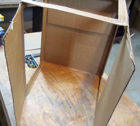 A card board is on the floor.