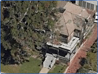 Areal Photo of a large two story house.