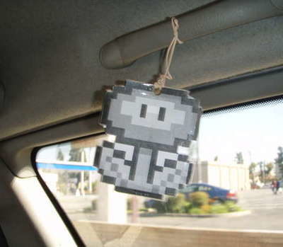 Homemade air freshener is hanging inside the car.