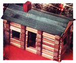 A log cabin is built out of building blocks.