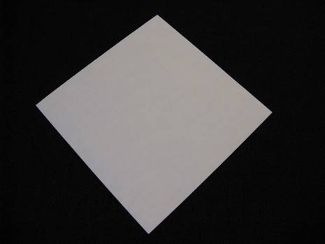 A piece of squared white paper to prepare Santa.