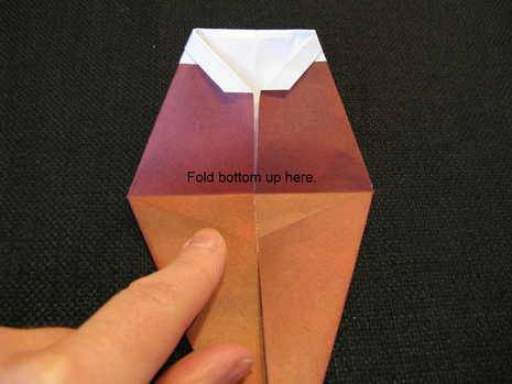 A piece of paper is partially folded.