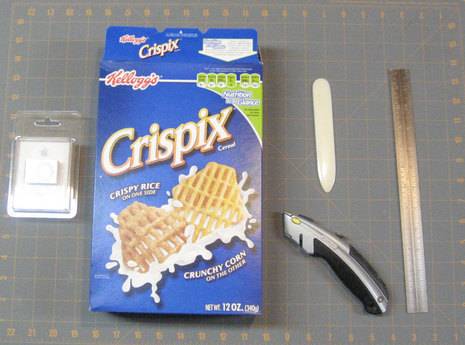 Cereal, scale, cutter, wooden stick, and plaster to make gift box.