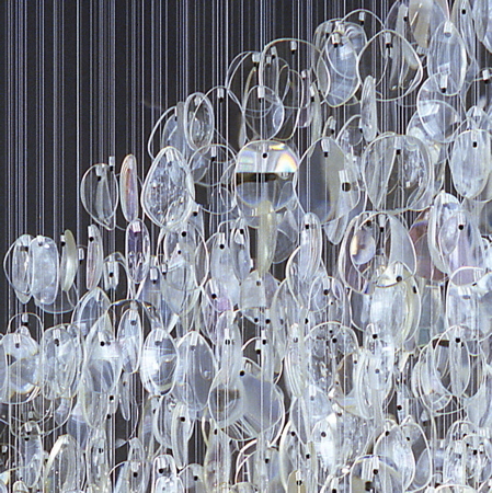 "Chandelier made of lenses from old, unwanted eyeglasses."