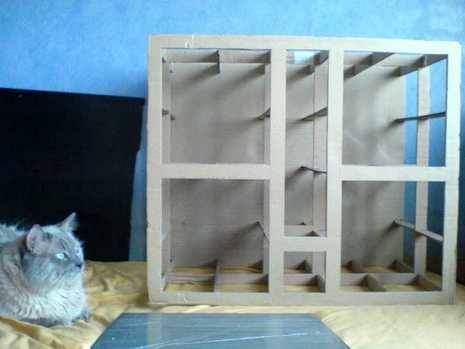 A wooden furniture built with simple cardboard sheets.