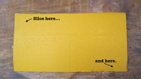 A yellow piece of paper with instructions of where to slice it at.