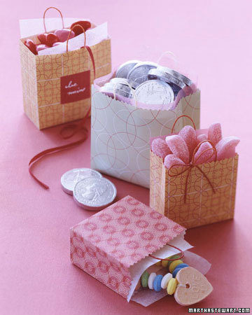 Four gift bags and two quarters on a pink background.