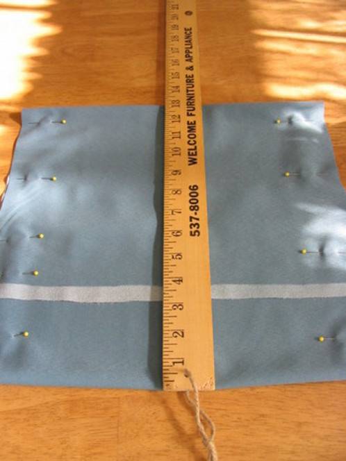 A swath of fabric being measured.