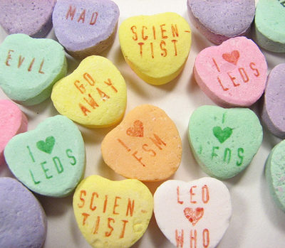 Candy Valentine's conversation hearts of different colors with different messages.