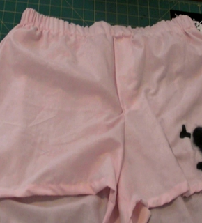 It showing how to make boxers from old pillowcases.