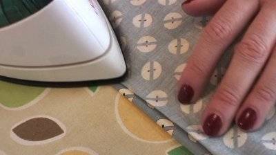 Performing a blind hem on a sewing machine.