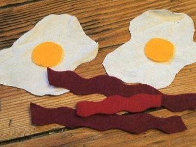 Fried eggs and bacon have been made out of felt.