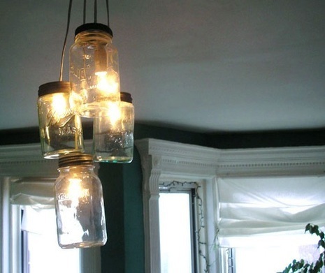A ceiling light with four lightbulbs.