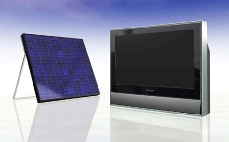 A solar panel sits near a flat screen television.