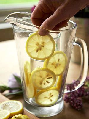 A jug of lemonade being made