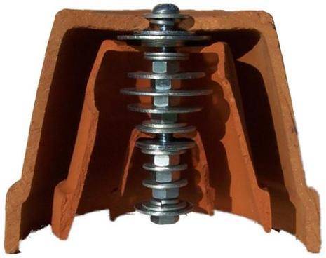 A screw is inside of two layers of brown material.