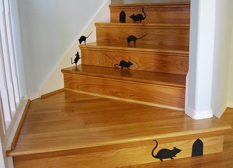 Woodend steps that have a series of mice prints on them.