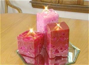 Candles that are made to look like cubes of meat, or pink salt.