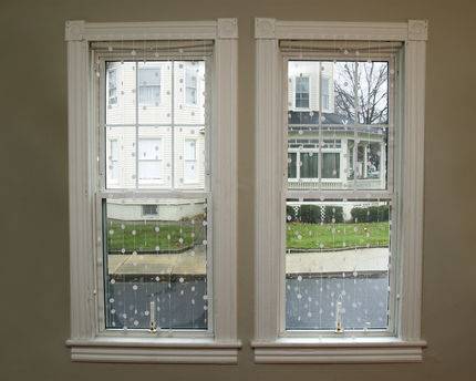 WINDOWS COVERED WITH SNOW FALL CURTAINS