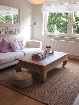 An airy living room decorated on a budget.