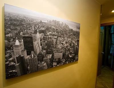 Picture of New York hanging in the hallway of a home.
