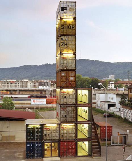 Shipping containers arranged like a building.