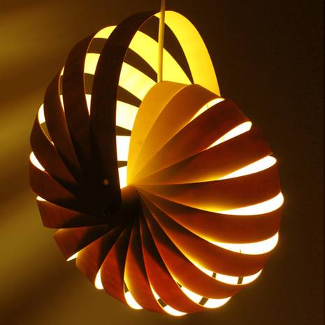 Lamp that is shaped like a shell.