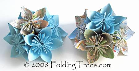 Origami flowers folded into a paper flower bouquet.